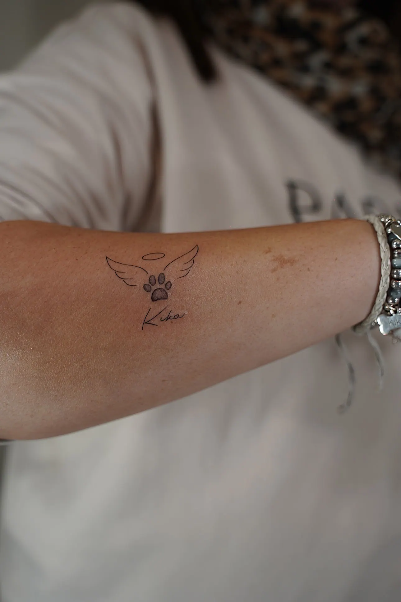 Memorial Pet Tattoo Pfote mit Flügeln und Name